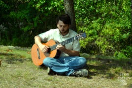 7/30/2014. Tim Aznavourian plays classical guitar.